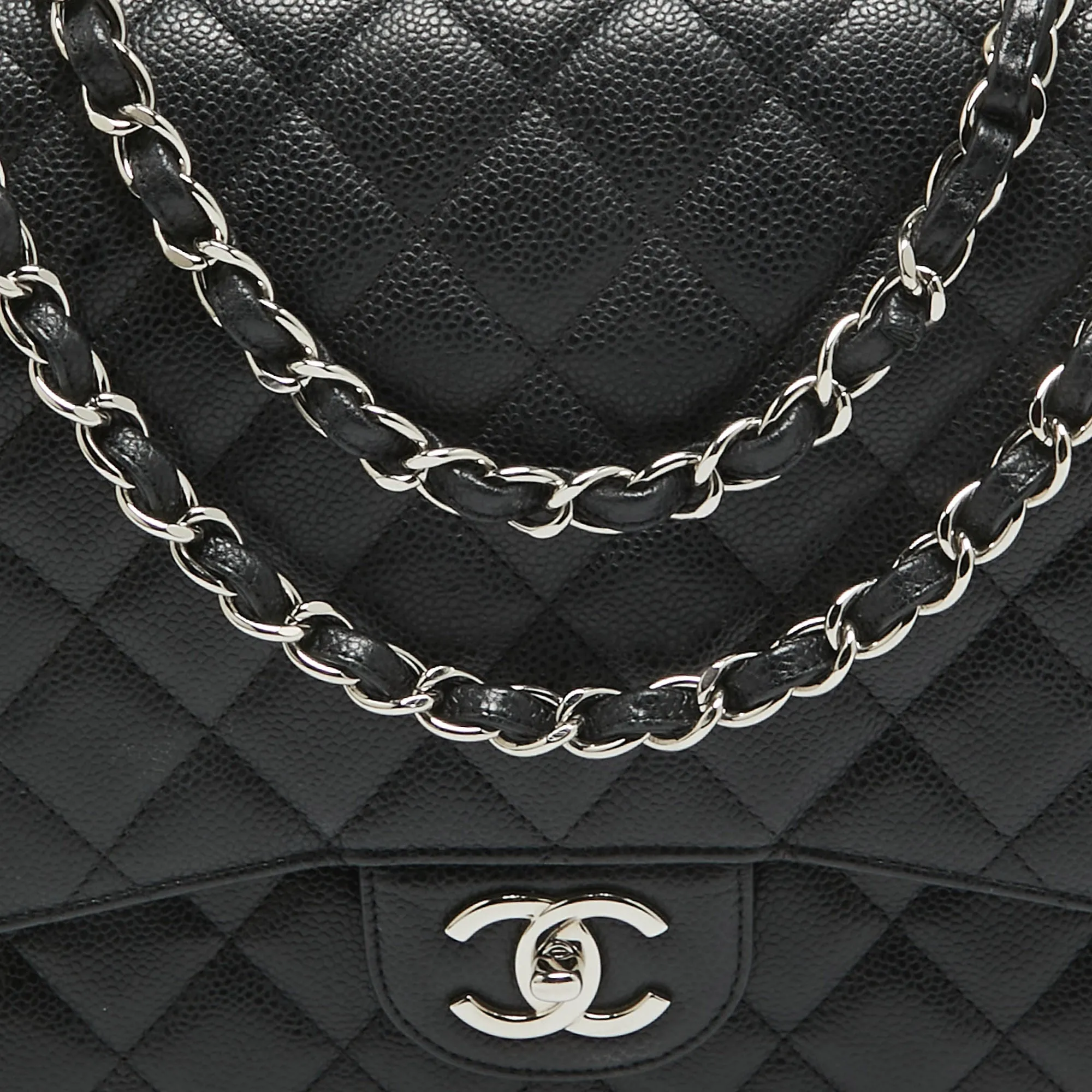 CHANEL Black Quilted Caviar Leather Maxi Classic Double Flap Bag