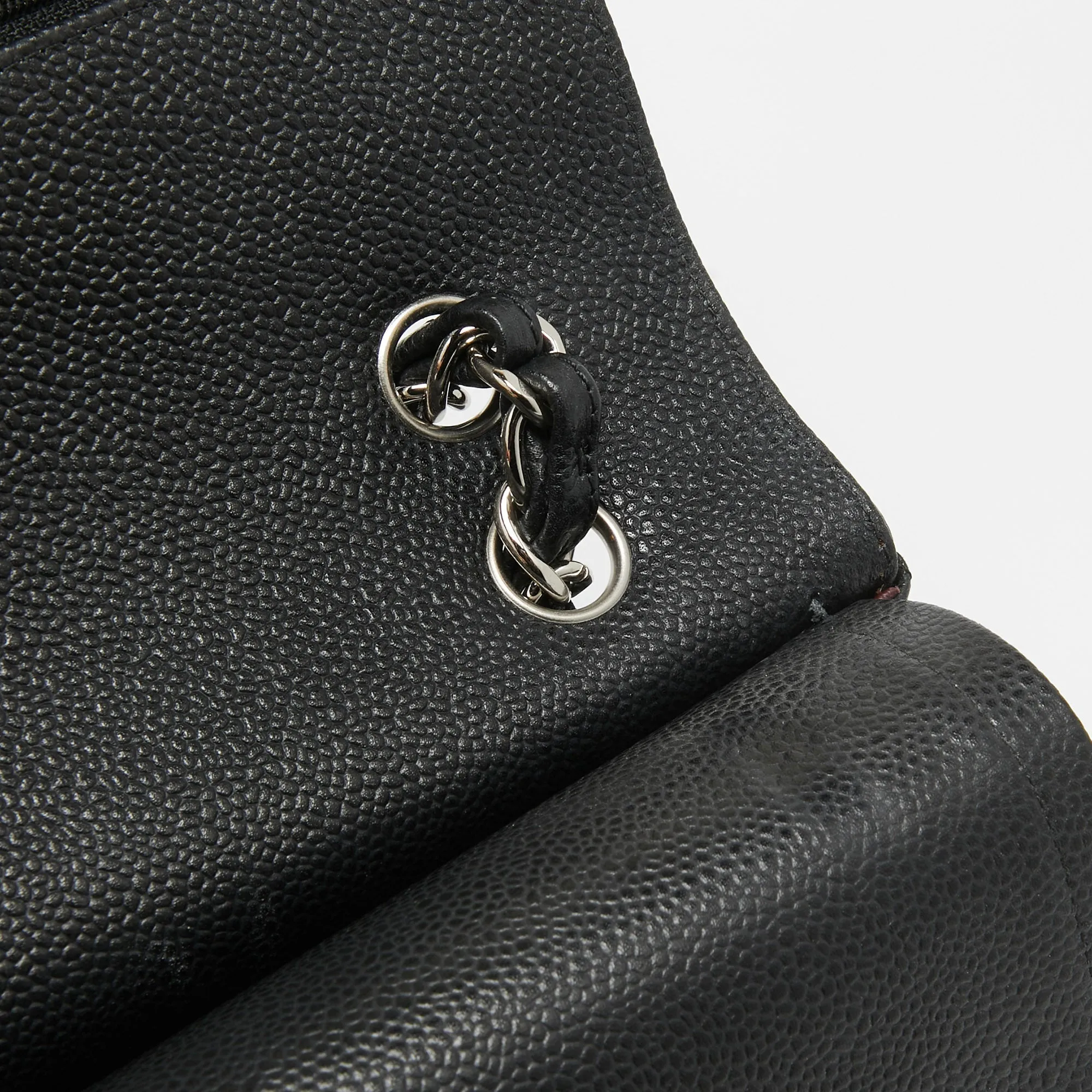 CHANEL Black Quilted Caviar Leather Maxi Classic Double Flap Bag