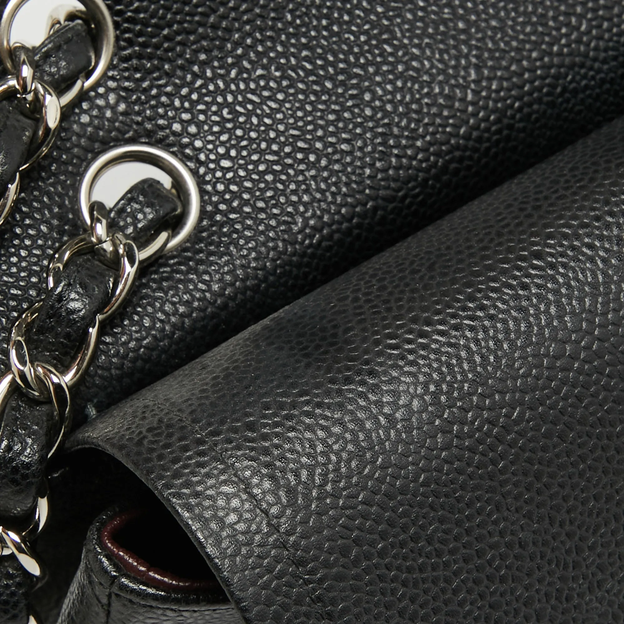 CHANEL Black Quilted Caviar Leather Maxi Classic Double Flap Bag