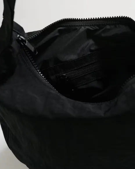 NEW Baggu Nylon Crescent Bag - Black - Made of recycled heavyweight nylon with a recycled ripstop nylon lining, wear crossbody or slung over Retails for $65!